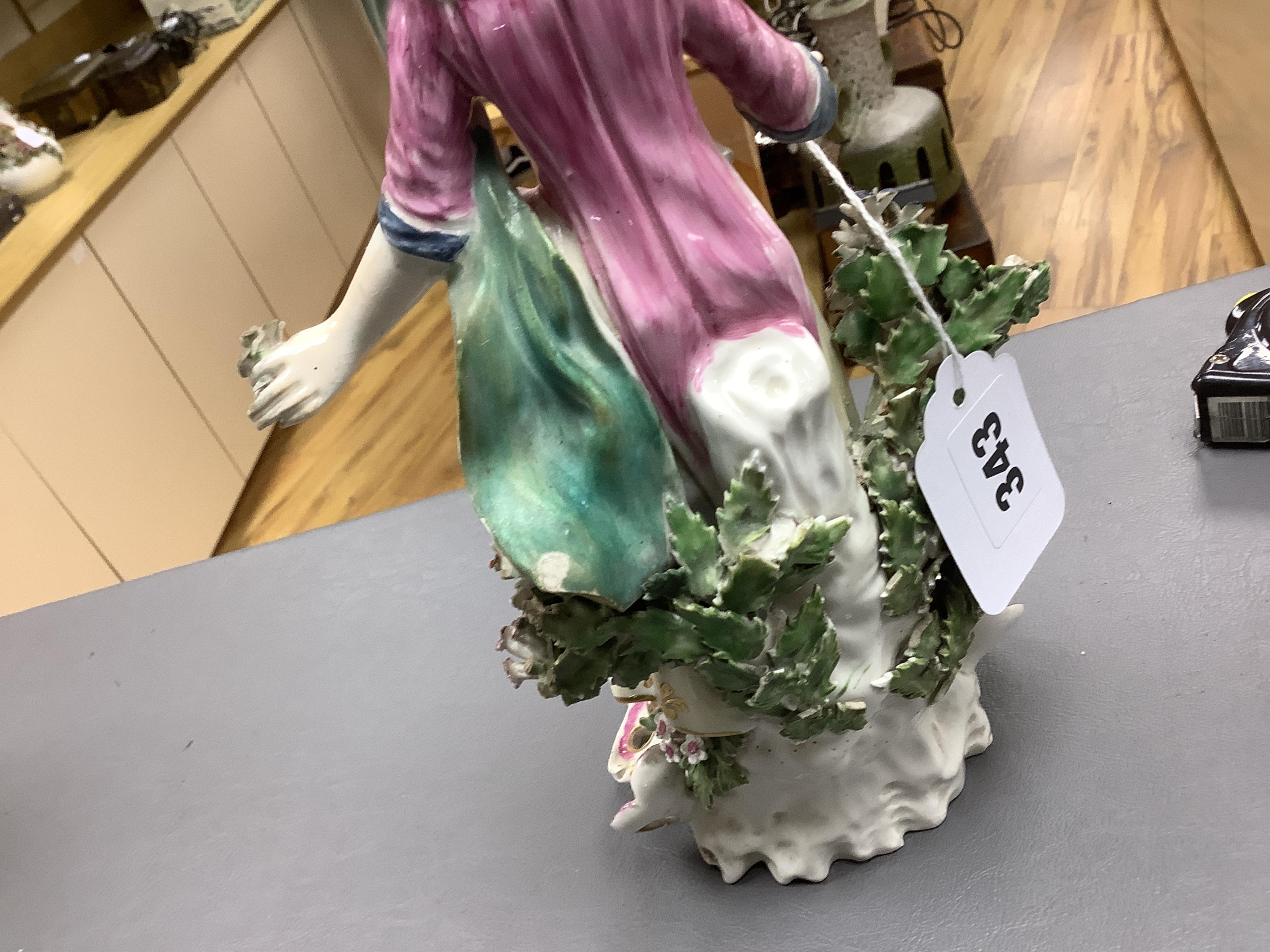 A pair of 18th century Derby porcelain figures of a lady and gentleman, 27cm high